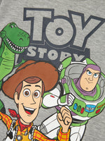 NMMOLIVER TOYSTORY LS NREG TOP WDI